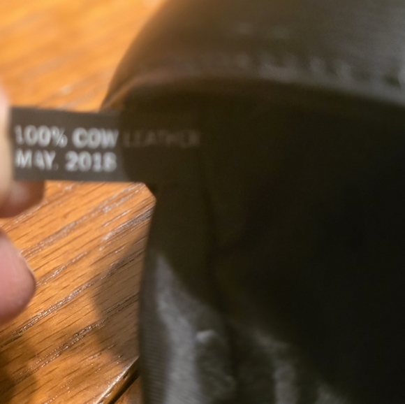 DKNY Bryant Medium Zippered Tote Bag in black leather with gold-tone hardware.  - Picture 5 of 17